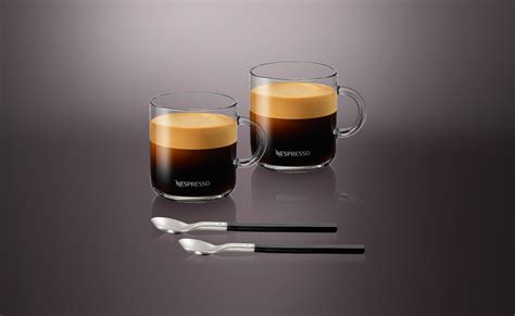 Nespresso gran lungo - Set of 2 with Spoons. The best way to appreciate coffee is to drink from a glass cup in order to enjoy the quality crema. Choose this stylish set made of tempered glass, created specifically to use with Vertuo machines. The set is completed with two spoons. Cups 9 oz/265 ml, spoons 5.9 in/15 cm. (ALL PRICES EXCLUDE TAXES) Set of 2 Vertuo Gran ... 